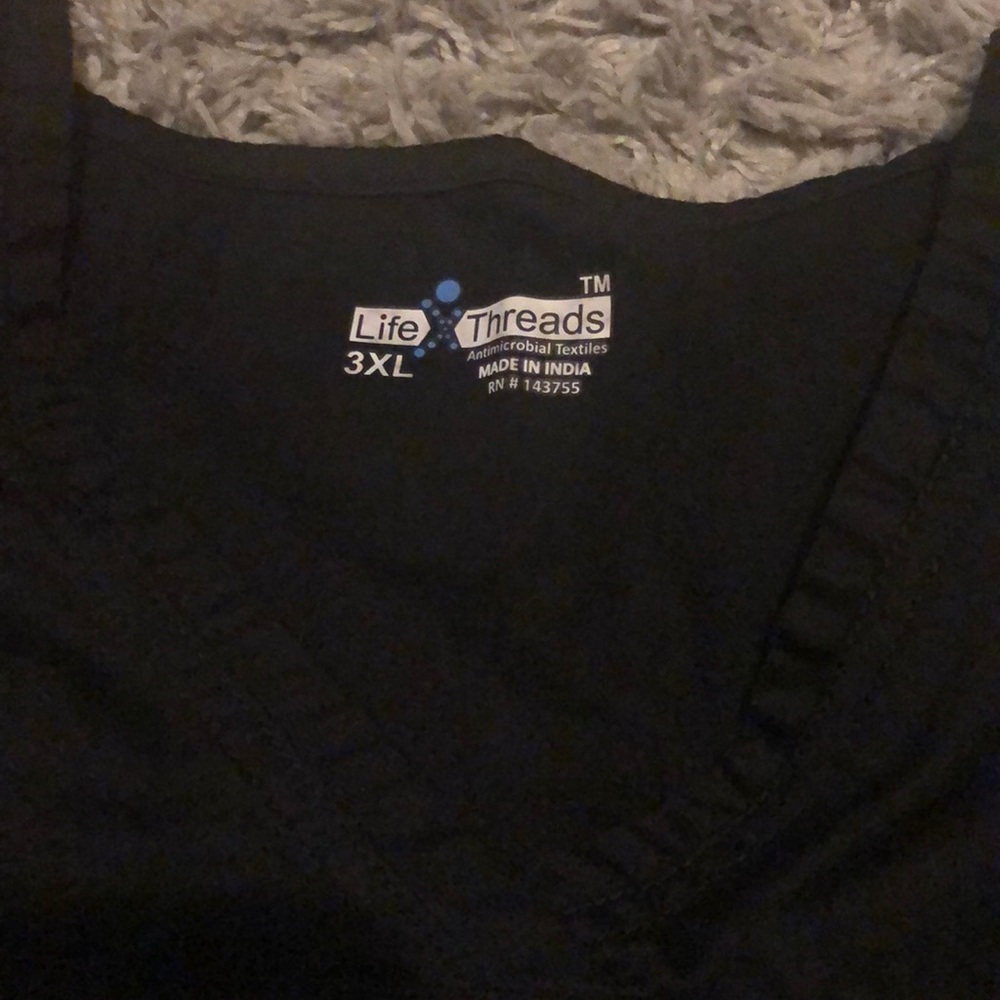 Black scrub shirt